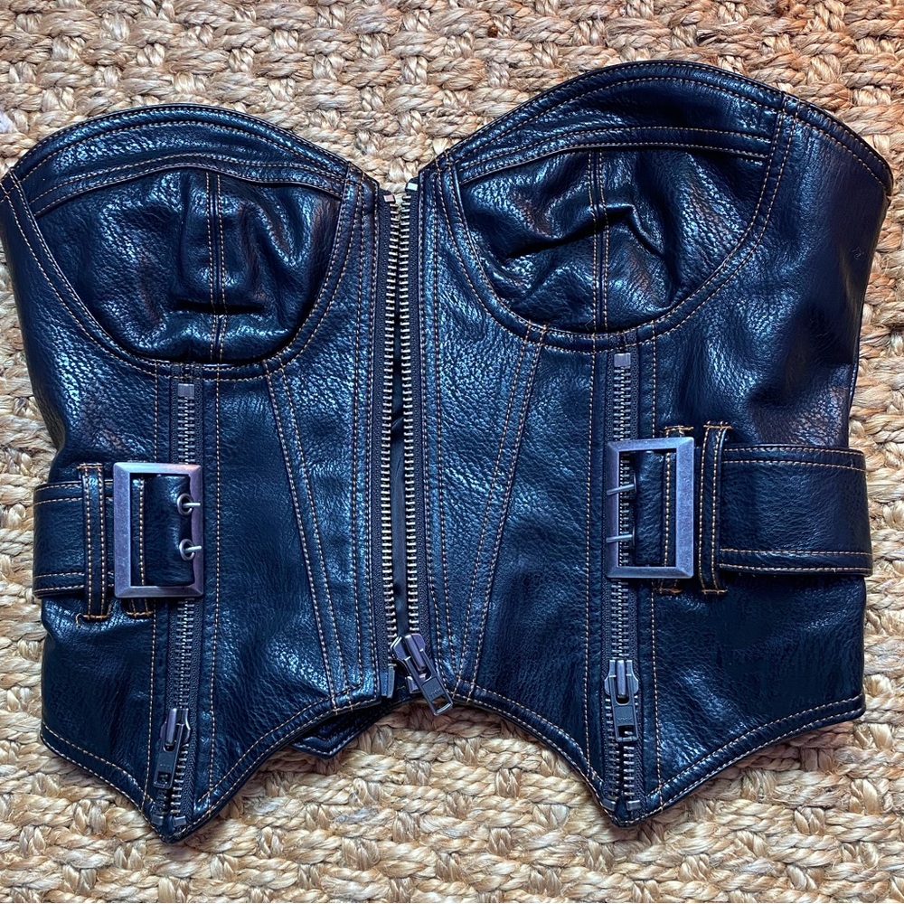 I.AM.GIA leather corset with zipper and butterfly detail on back